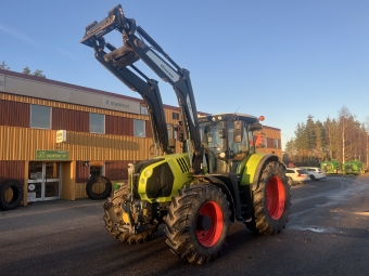 Traktor Claas ARION 660 CMATIC m lastare Claas ARION 660 CMATIC 